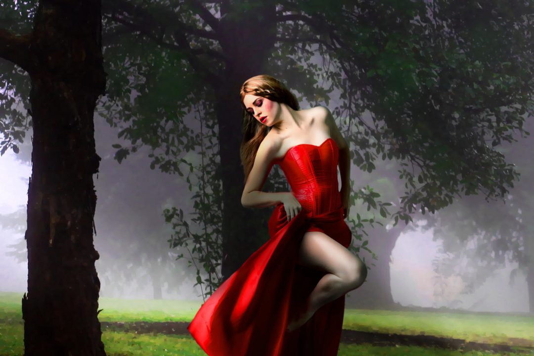 photoshop composing of a beautiful lady with red dress in nature